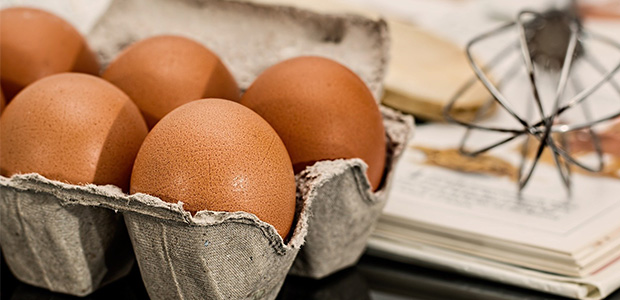 eggs in carton on table